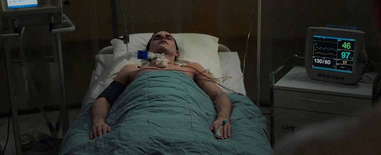 The comatose Matvei (Andrey Marusin) in The Ice Demon (2021)