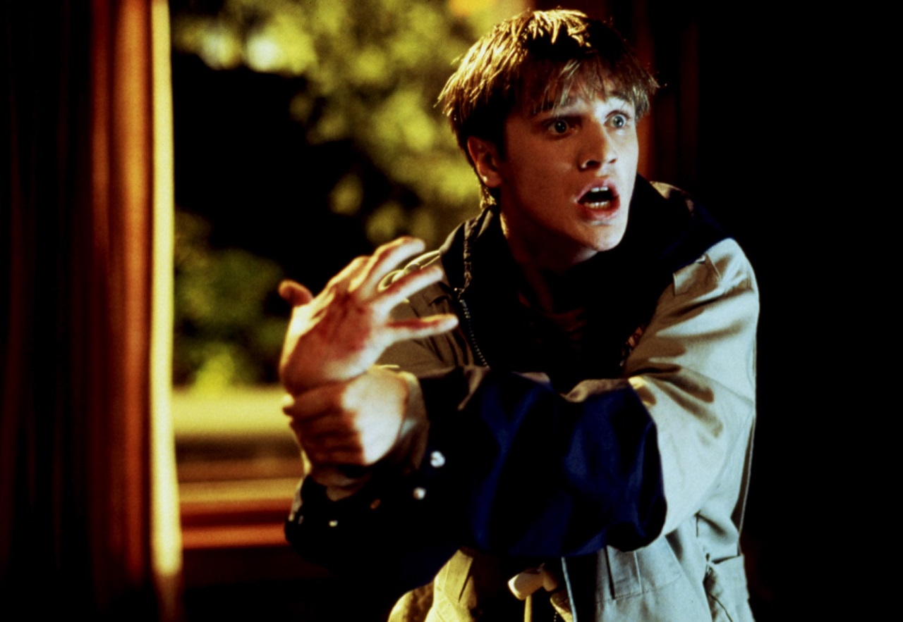 Anton Tobias (Devon Sawa) and possessed hand in Idle Hands (1999)