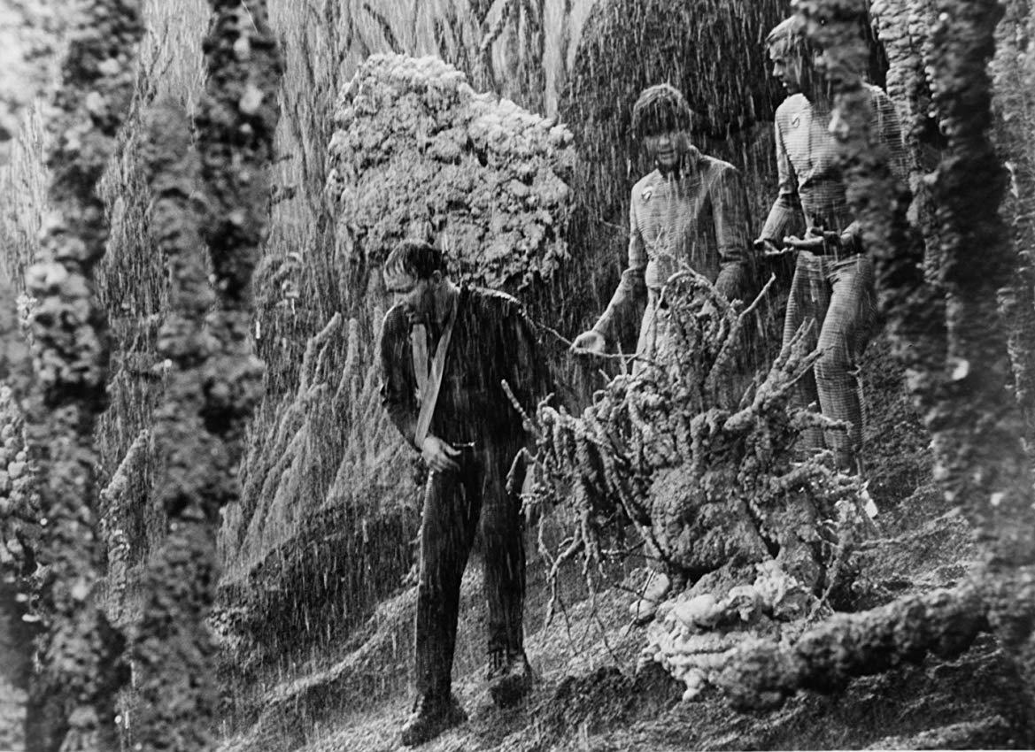 Astronauts in the torrential downpour of Venus in The Long Rains episode of The Illustrated Man (1969)