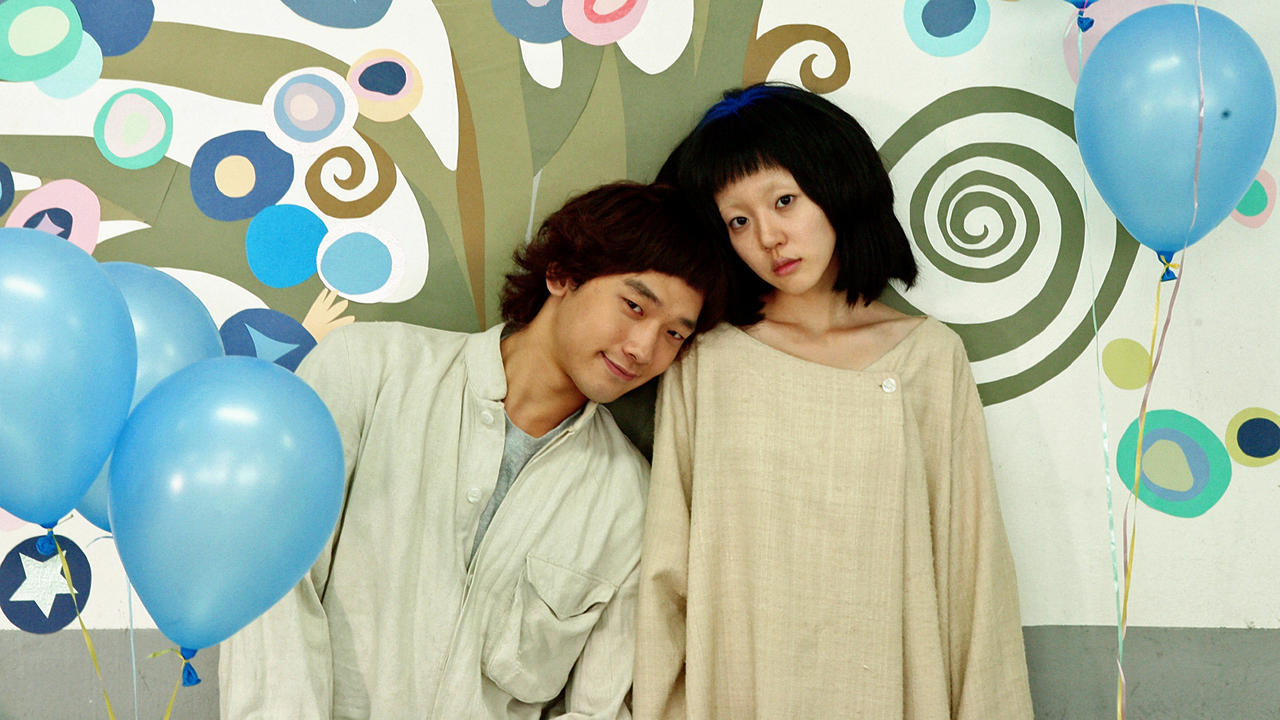 Romance in a psychiatric institution between Rain and Su-jeong Lim in I'm a Cyborg, But That's Ok (2006)