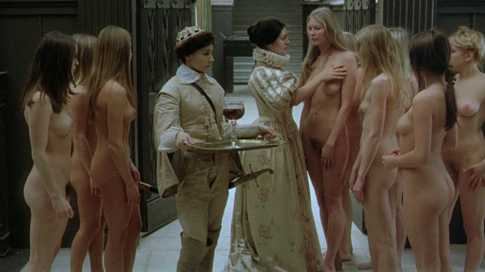Countess Bathory (Paloma Picasso) examines the girls brought to her in the Erzbet Bathory episode of Immoral Tales (1974) 