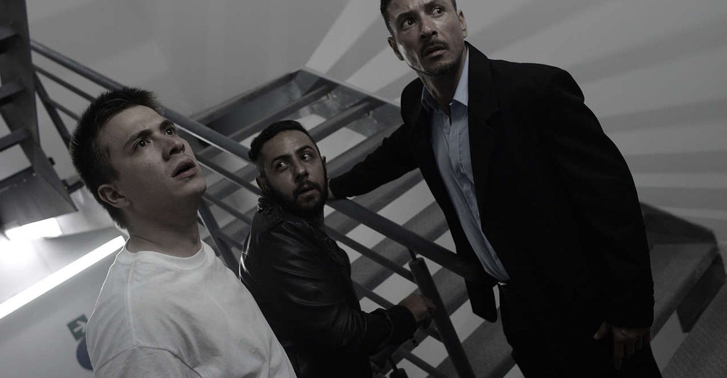 Trapped in a never-ending stairwell - Raul Mendez, Humberto Busto and Fernando Alvarez Rebeil in The Incident (2014)