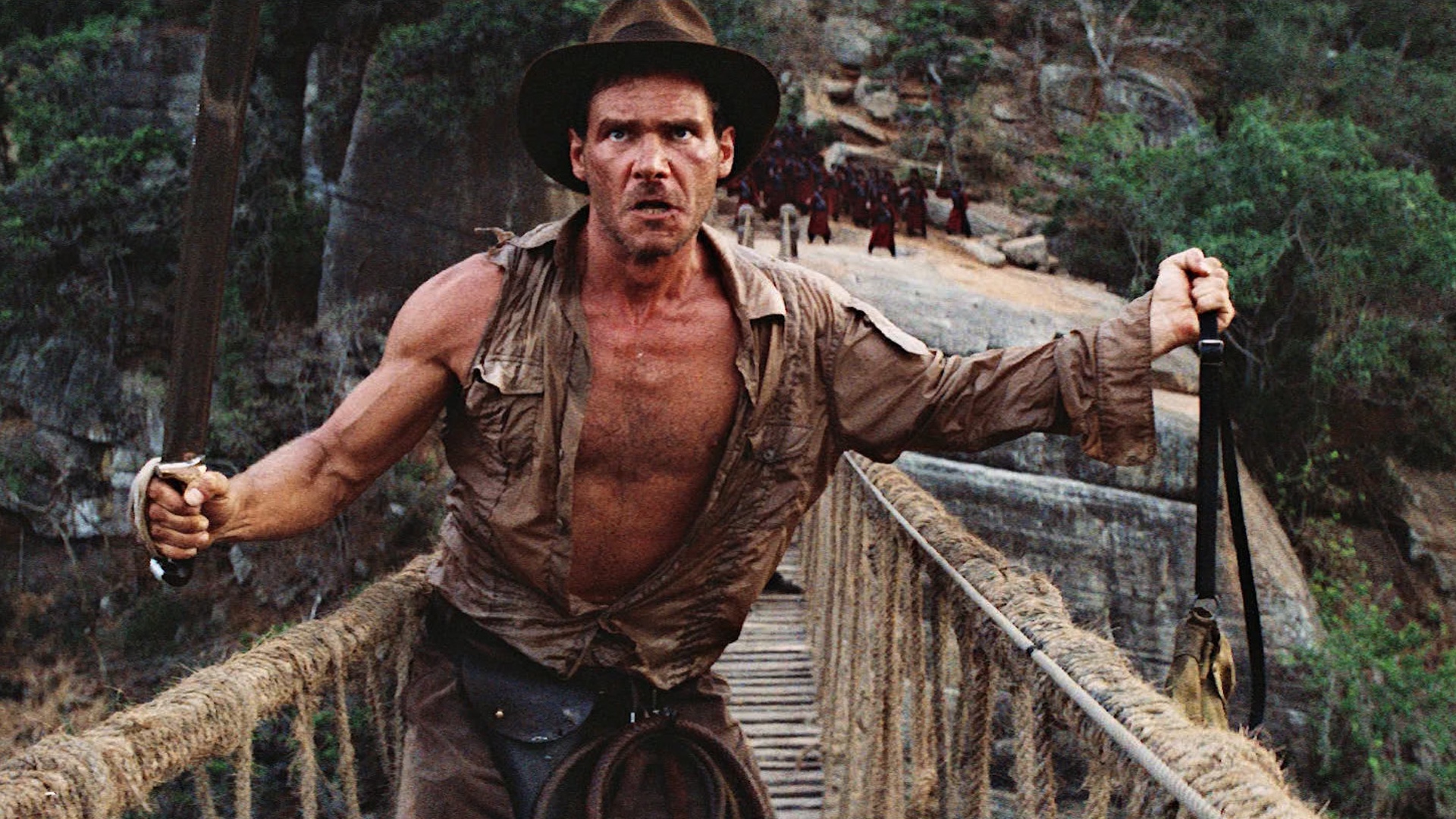 Harrison Ford trapped on the rope bridge in Indiana Jones and the Temple of Doom (1984)