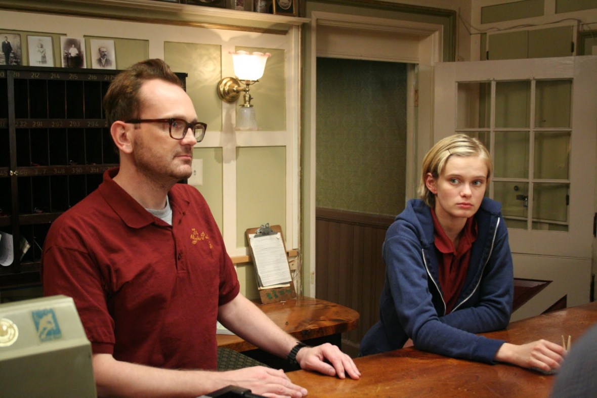 Hotel desk clerks Pat Healy and Sara Paxton in The Innkeepers (2011)