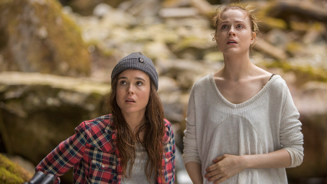 (l to r) Sisters Ellen Page and Evan Rachel Wood trying to survive on their own in Into the Forest (2015)