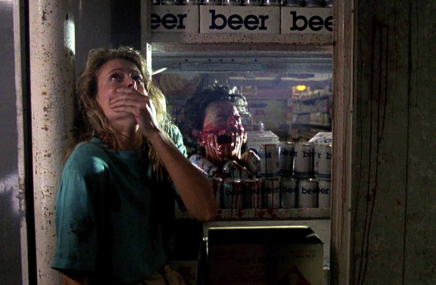 Elizabeth Cox finds a severed head in the refrigerator in Intruder (1989)