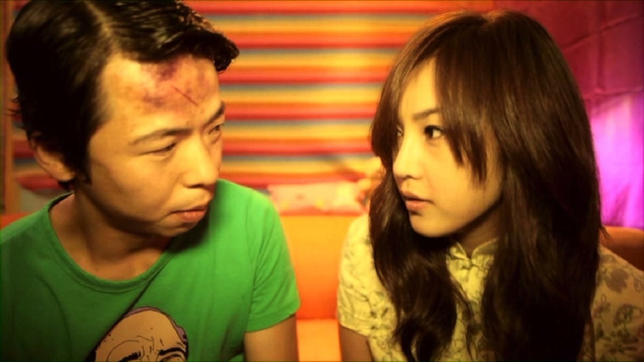 (l to r) Human Young Gun (Hong Youngguen) and alien girl Monica (Eun-Jung Ha) in Invasion of Alien Bikini (2011)