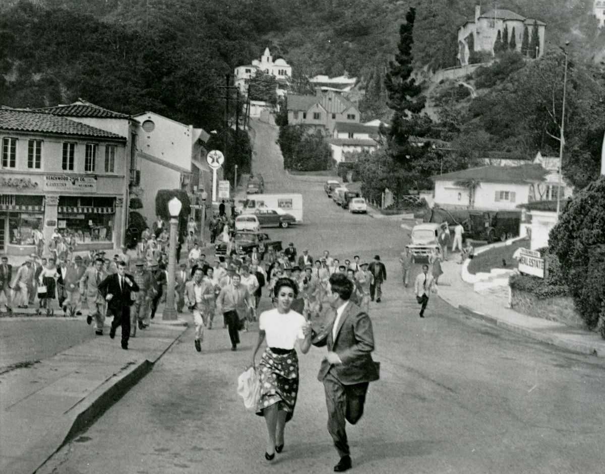 Dana Wynter and Kevin McCarthy on the run from the town of pod people in Invasion of the Body Snatchers (1956)