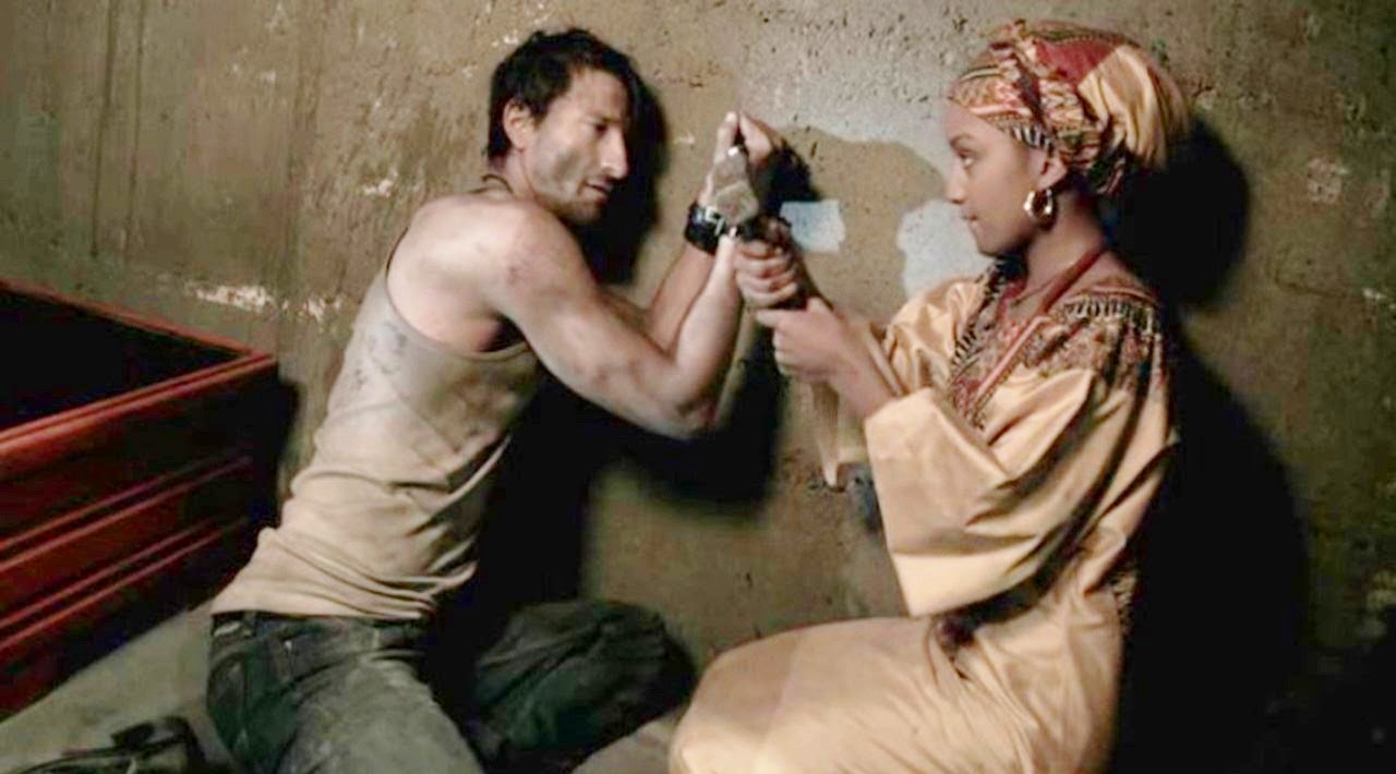 Axel Wedekind and Rungano Nyoni in Iron Doors (2010)