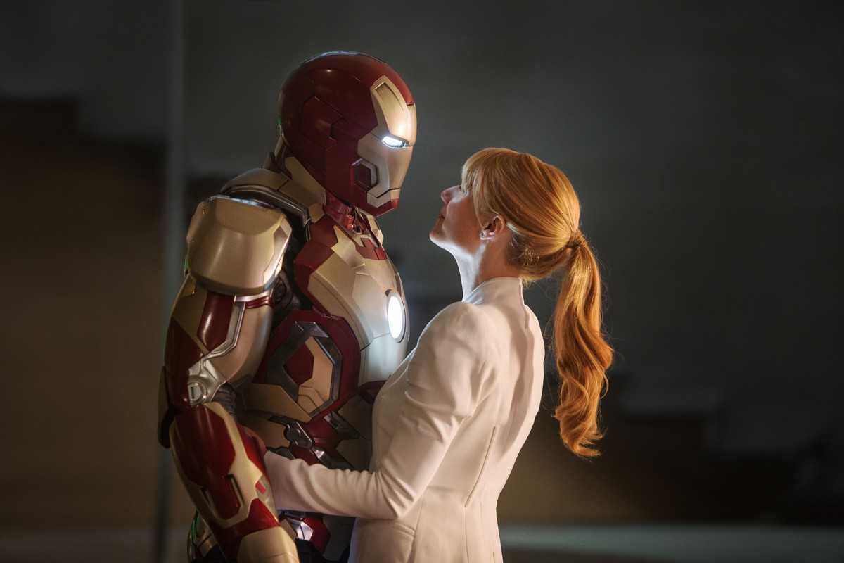 Iron Man (Robert Downey Jr) and Pepper Potts (Gwyneth Paltrow) share a tender moment in Iron Man Three (2013) 