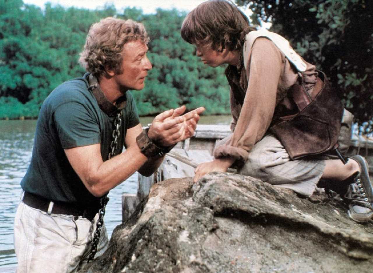 Blair Maynard (Michael Caine) and his son Justin (Jeffrey Frank) in The Island (1980)