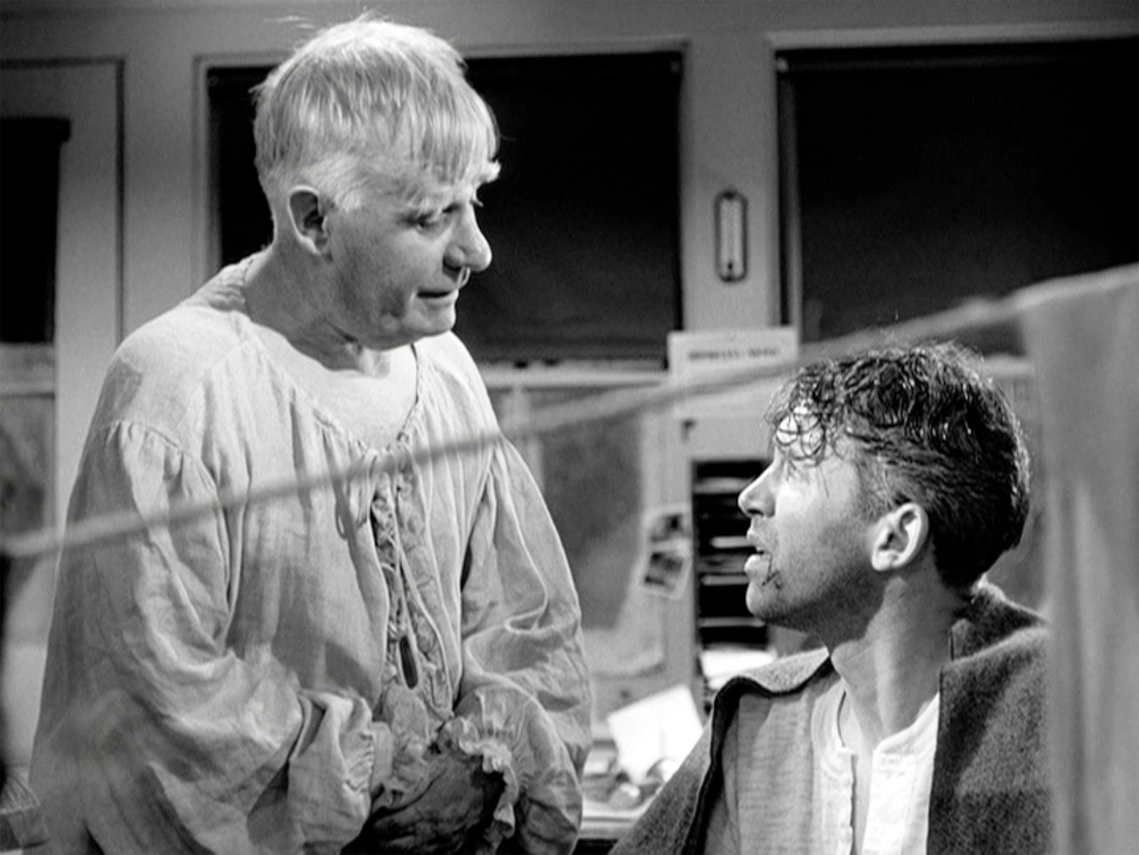 George Bailey (James Stewart) visited by the angel Clarence P. Oddbody (Henry Travers) in It;s a Wonderful Life (1946)