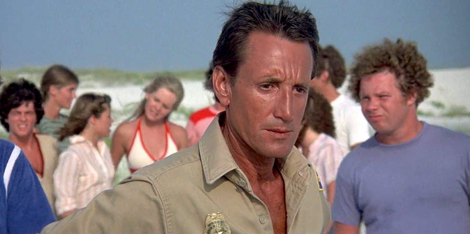 A paranoid Sheriff Brody (Roy Scheider) sees sharks everywhere in Jaws 2 (1978)