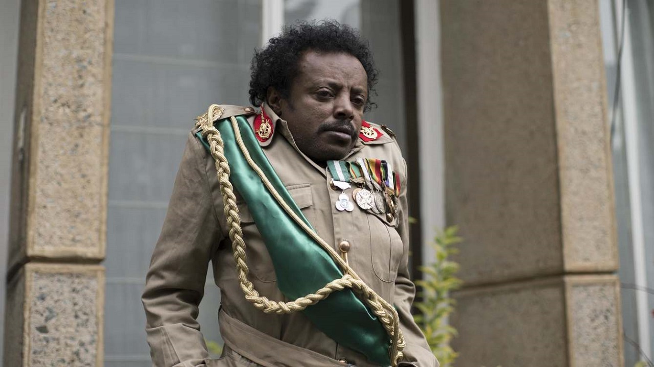 Daniel Tadesse as Agent D.T. Gagano in Jesus Shows the Way to the Highway (2019)