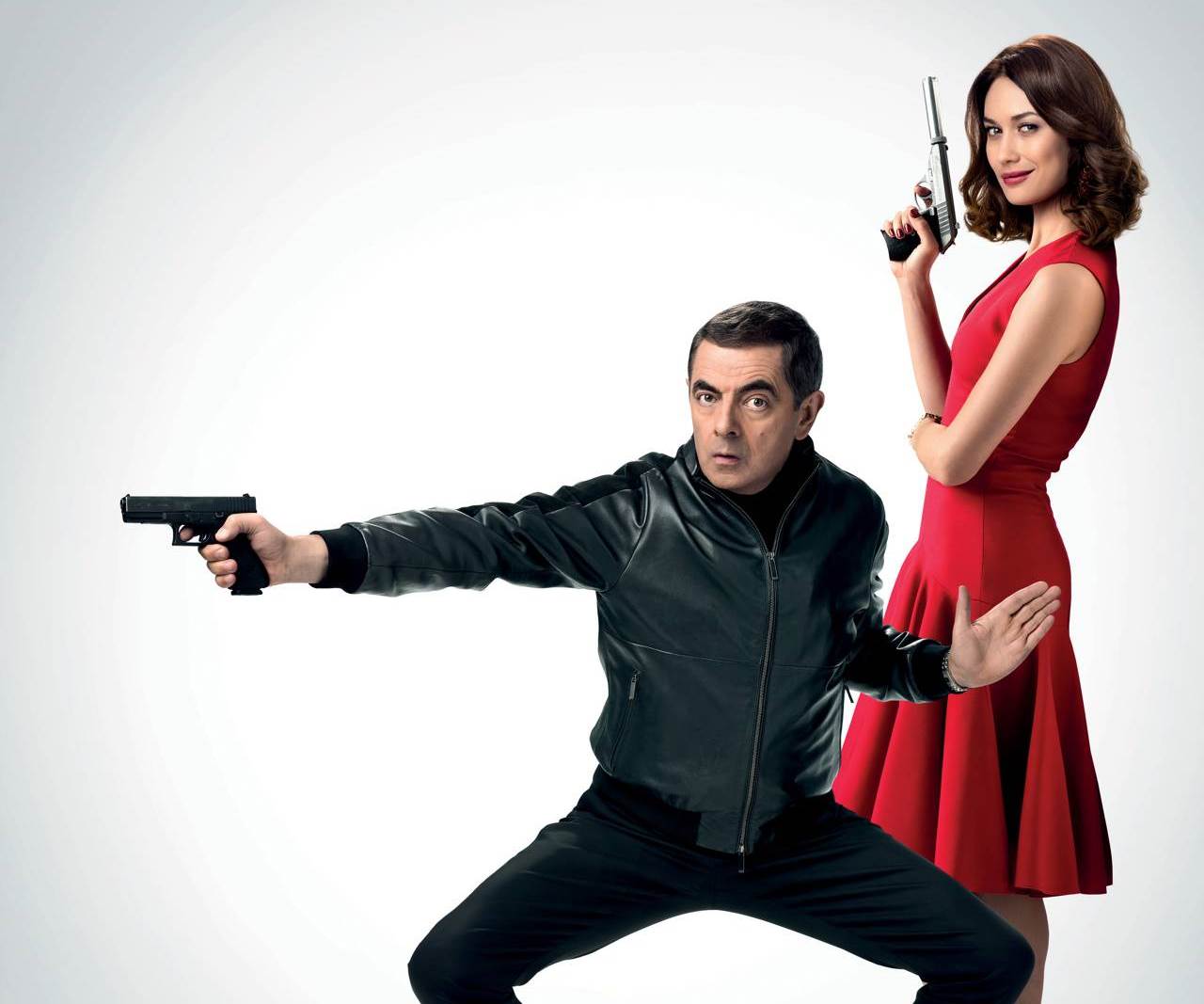 Johnny English (Rowan Atkinson) and Ophelia Bhuletova (Olga Kurylenko) in Johnny English Strikes Again (2018)