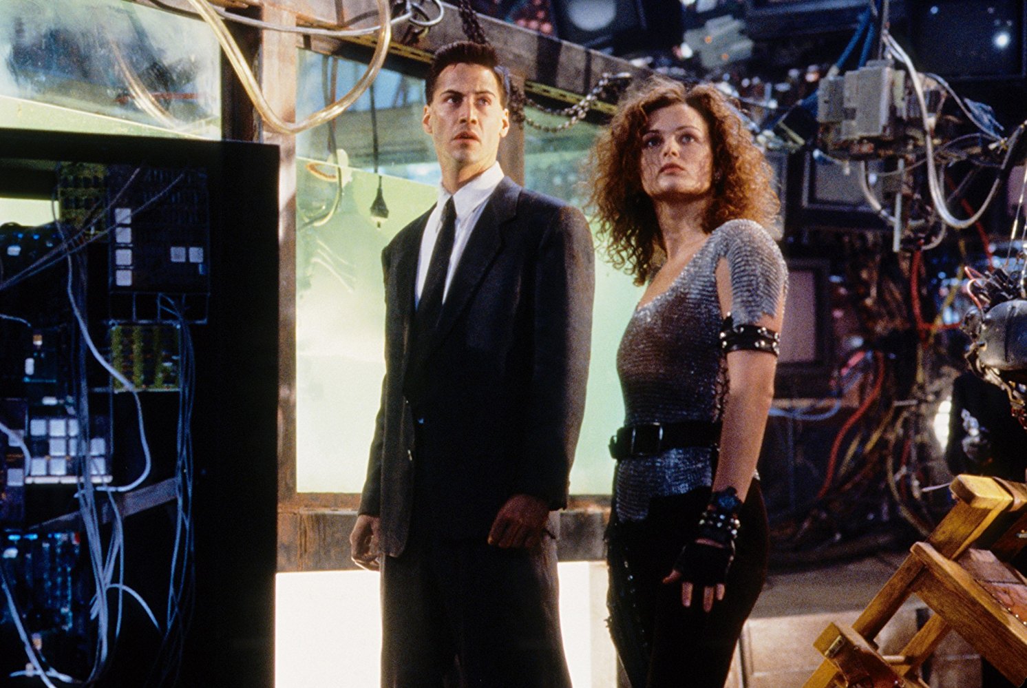 Keanu Reeves and Dina Meyer in a Cyberpunk future in Johnny Mnemonic (1995)