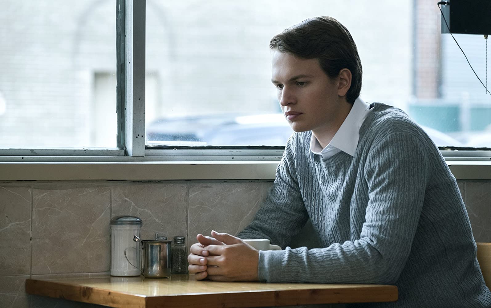 Ansel Elgort as Jonathan and John, two brothers living in the same body in Jonathan (2018)