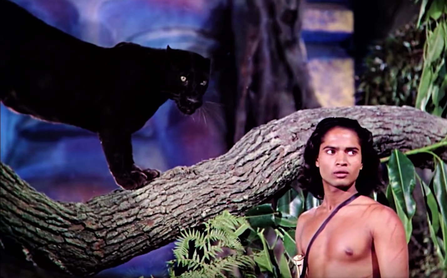 Mowgli (Sabu) and the panther Bagheera in Jungle Book (1942)