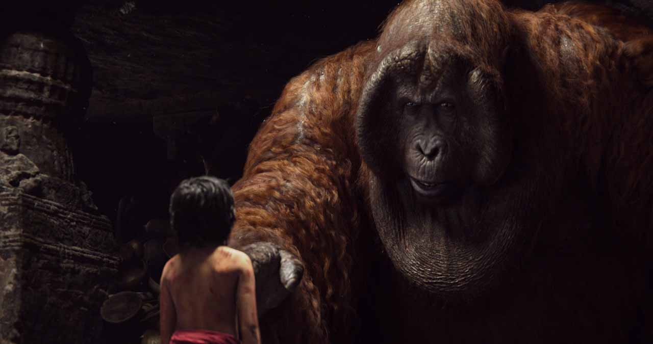 Mowgli (Neel Sethi) meets King Louie (voiced by Christopher Walken) in The Jungle Book (2016)