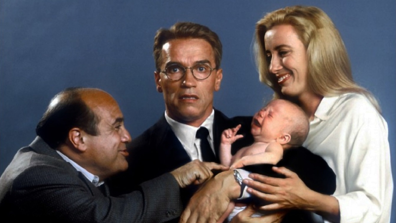 Publicity shot - (l to r) Danny DeVito, Arnold Schwarzenegger and his baby, and Emma Thompson in Junior (1994)