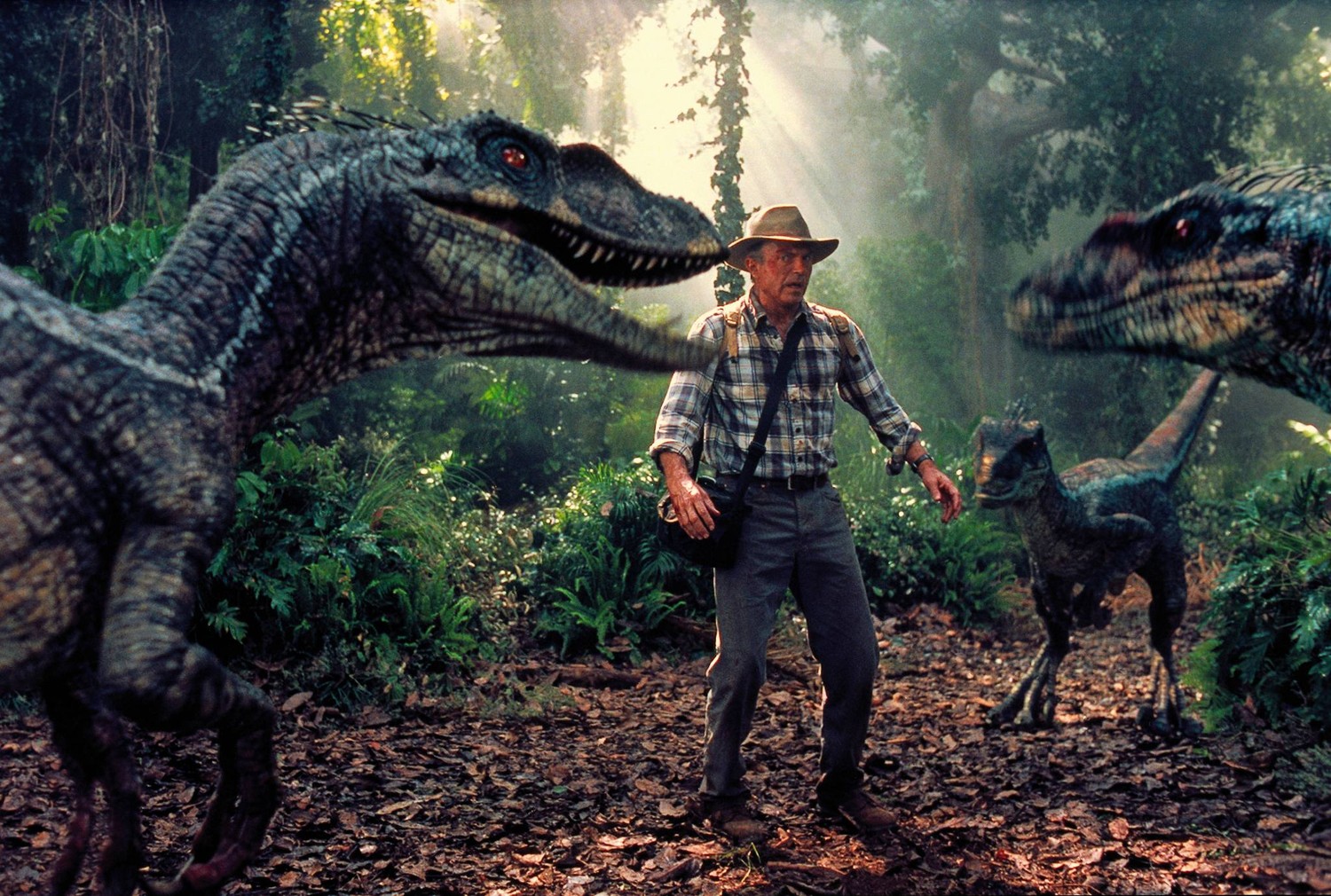 Sam Neill surrounded by velociraptors in Jurassic Park III (2001)