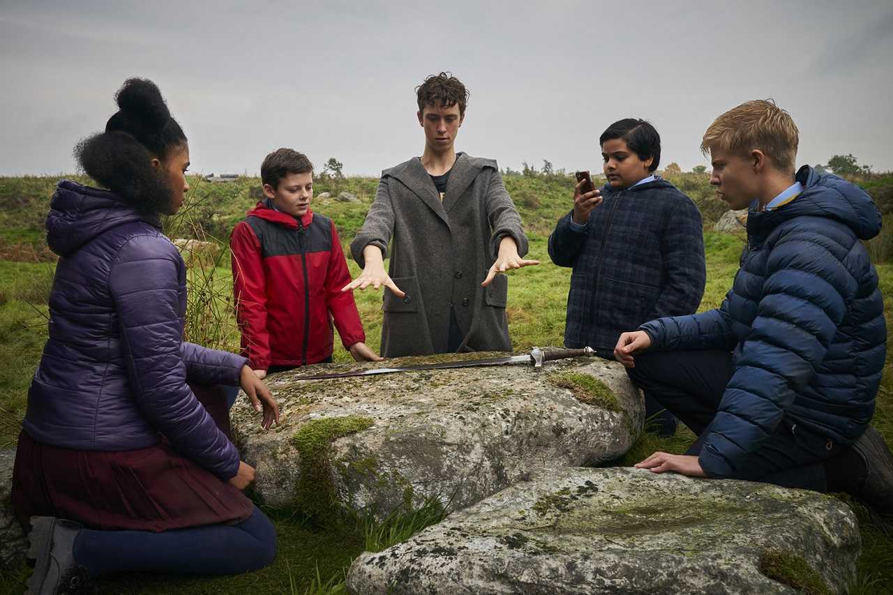 Kaye (Rhianna Dorris), Alex (Louis Ashbourne Serkis). Merlin (Angus Imrie), Bedders (Dean Chaumoo) and Lance (Tom Taylor) with Excalibur in The Kid Who Would Be King (2019)