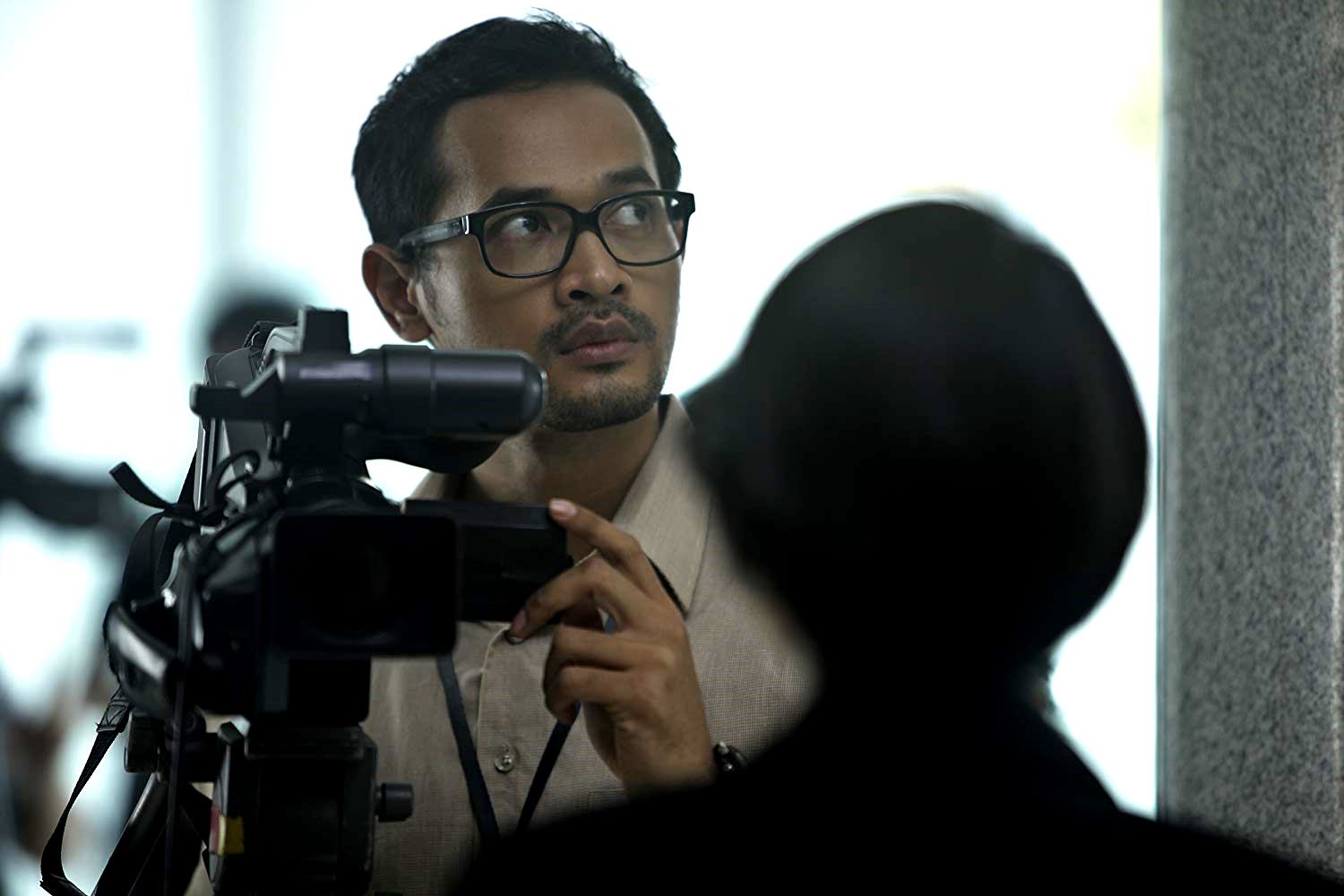 Oka Antara as the Indonesian apprentice Bayu Aditya in Killers (2014)