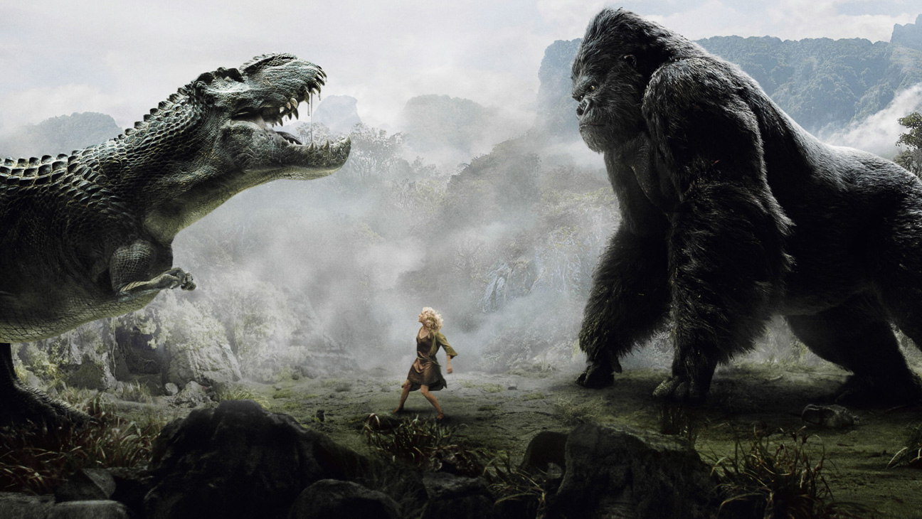 Kong vs dinosaur on Skull Island with Ann Darrow (Naomi Watts) in the middle in King Kong (2005)