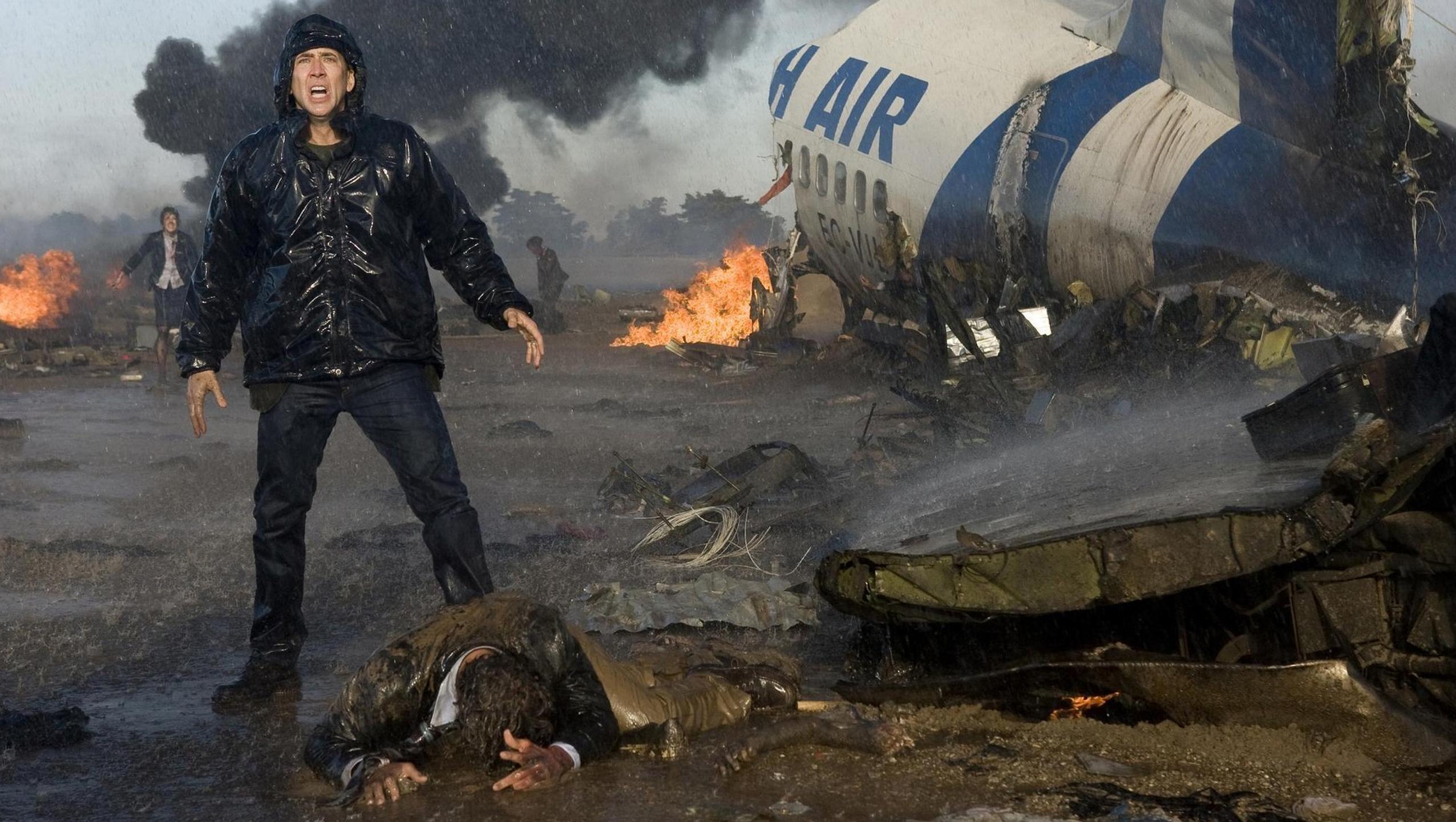 Nicolas Cage at the site of an airline disaster in Knowing (2009)