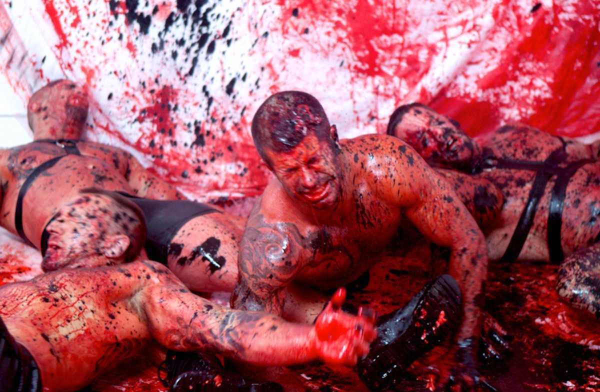 Gore-drenched orgy among a group of leather boys in L.A. Zombie (2010)