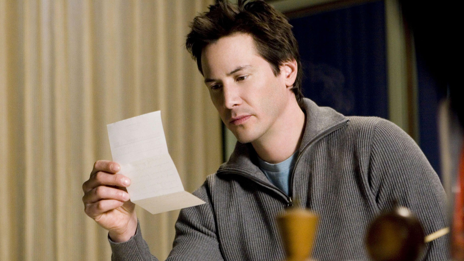 Keanu Reeves receives letters sent across time in The Lake House (2006)