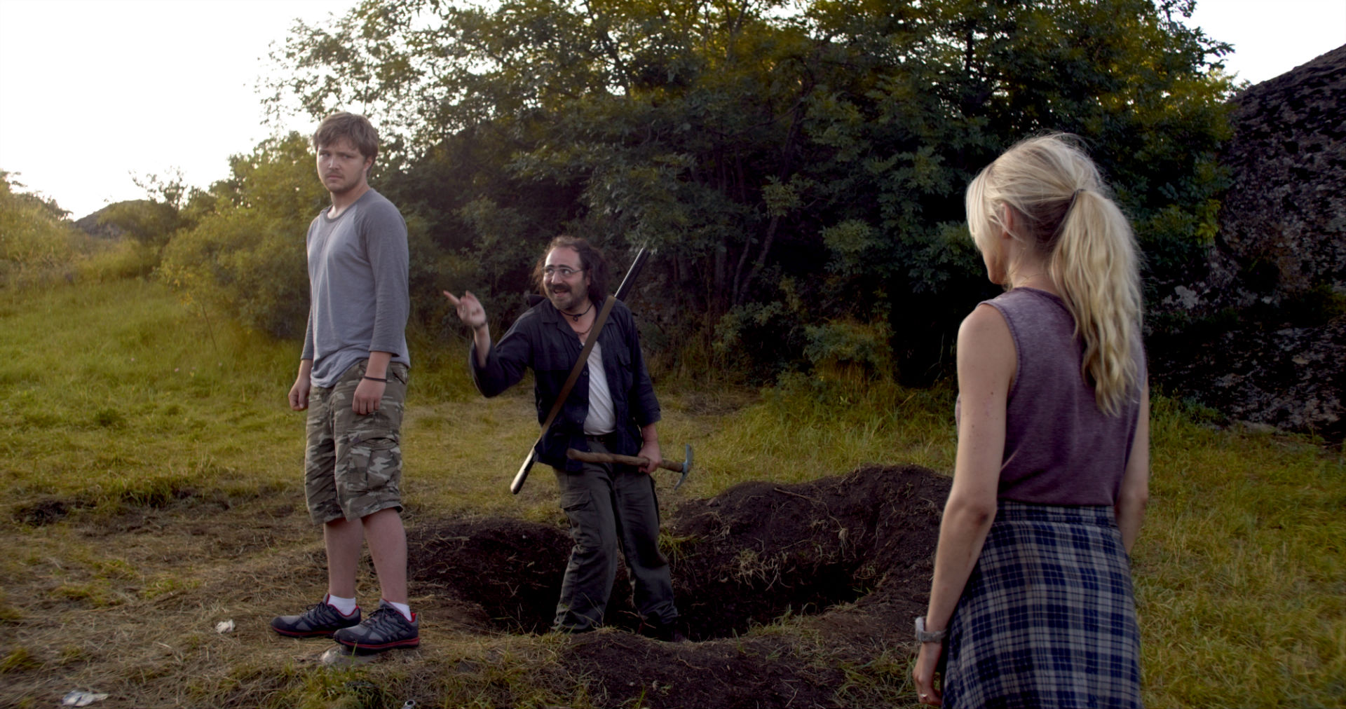 Sterling Knight stands on the mine while Kote Tolordava taunts from the hole and girlfriend Spencer Locke watches on in Landmine Goes Click (2015)