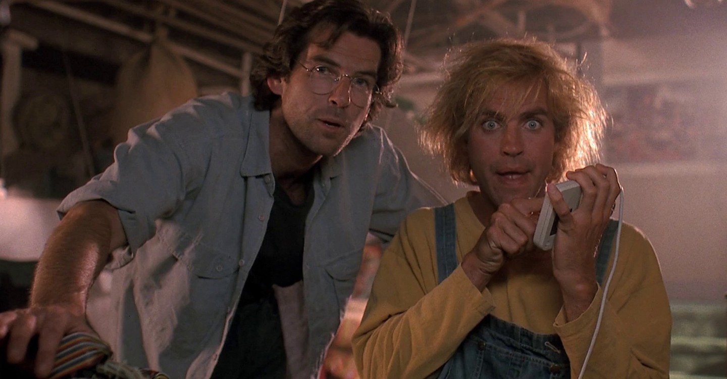 (l to r) Scientist Dr Lawrence Angelo (Pierce Brosnan) introduces his handicapped gardener Jobe (Jeff Fahey) to Virtual Reality in The Lawnmower Man (1992)