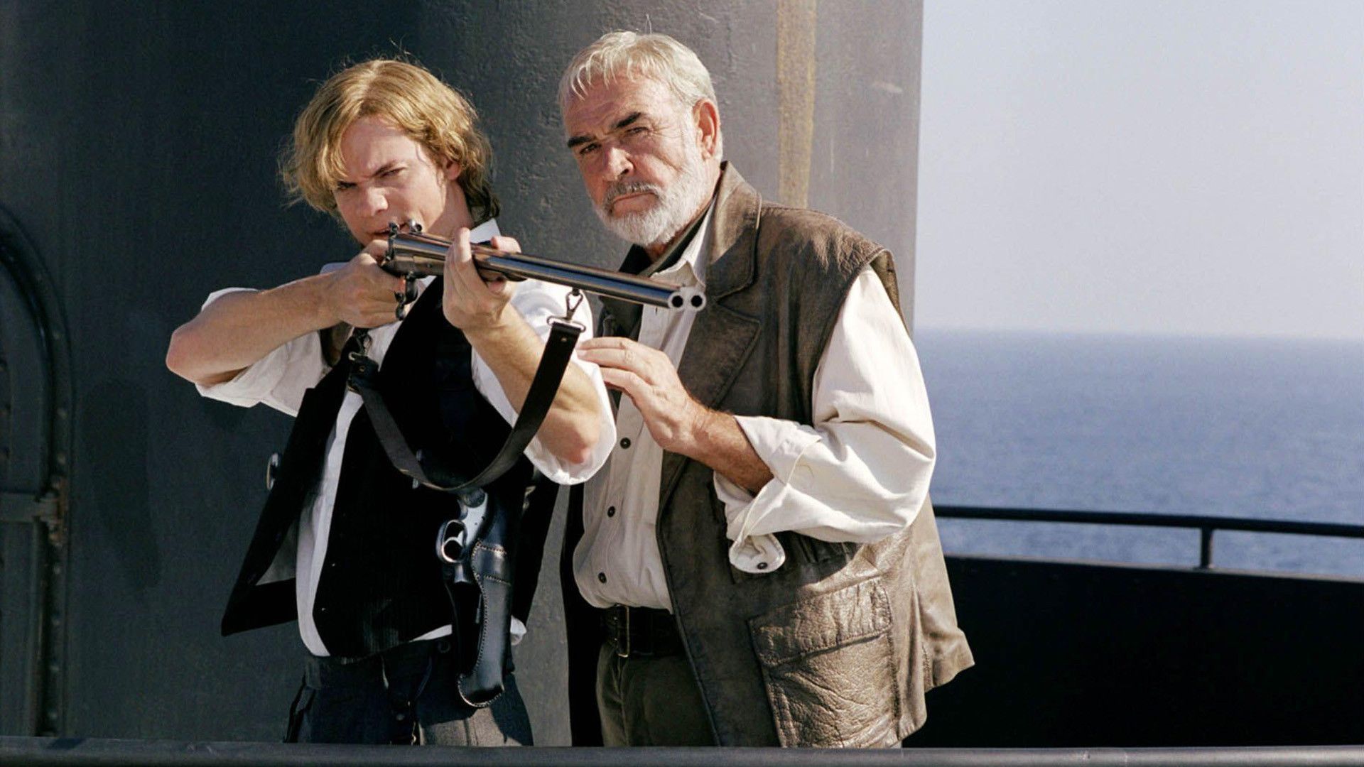 Allan Quatermain (Seam Connery) teaches Tom Sawyer (Sane West) to shoot in The League of Extraordinary Gentlemen (2003)