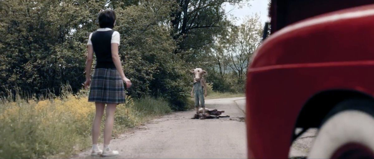 Lorina Kamburova encounters the young Jed (Boris Kabakchiev) in Leatherface (2017)