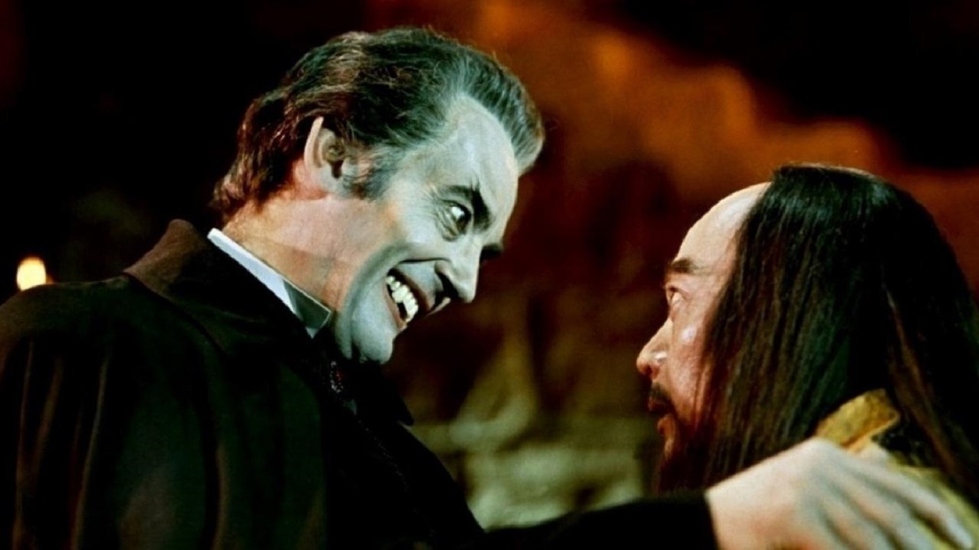 Dracula (John Forbes-Robertson) puts the bite on Kah (Chan Shen) in The Legend of the 7 Golden Vampires (1974)