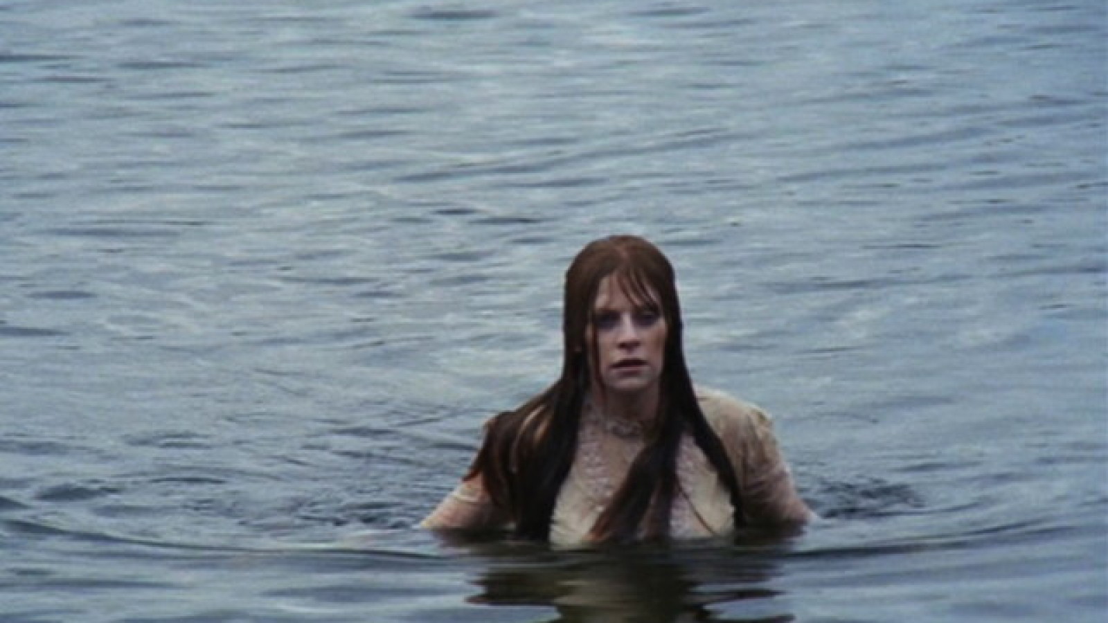 Mariclare Costello rises from the lake in Let's Scare Jessica to Death (1971)