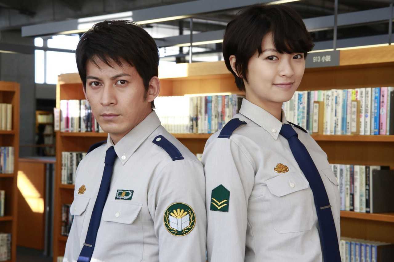 Members of the Library Defence Force - Atsushi Dojo (Junichi Okada) and Iku Kasahara (Nana Eikura) in Library Wars (2013)