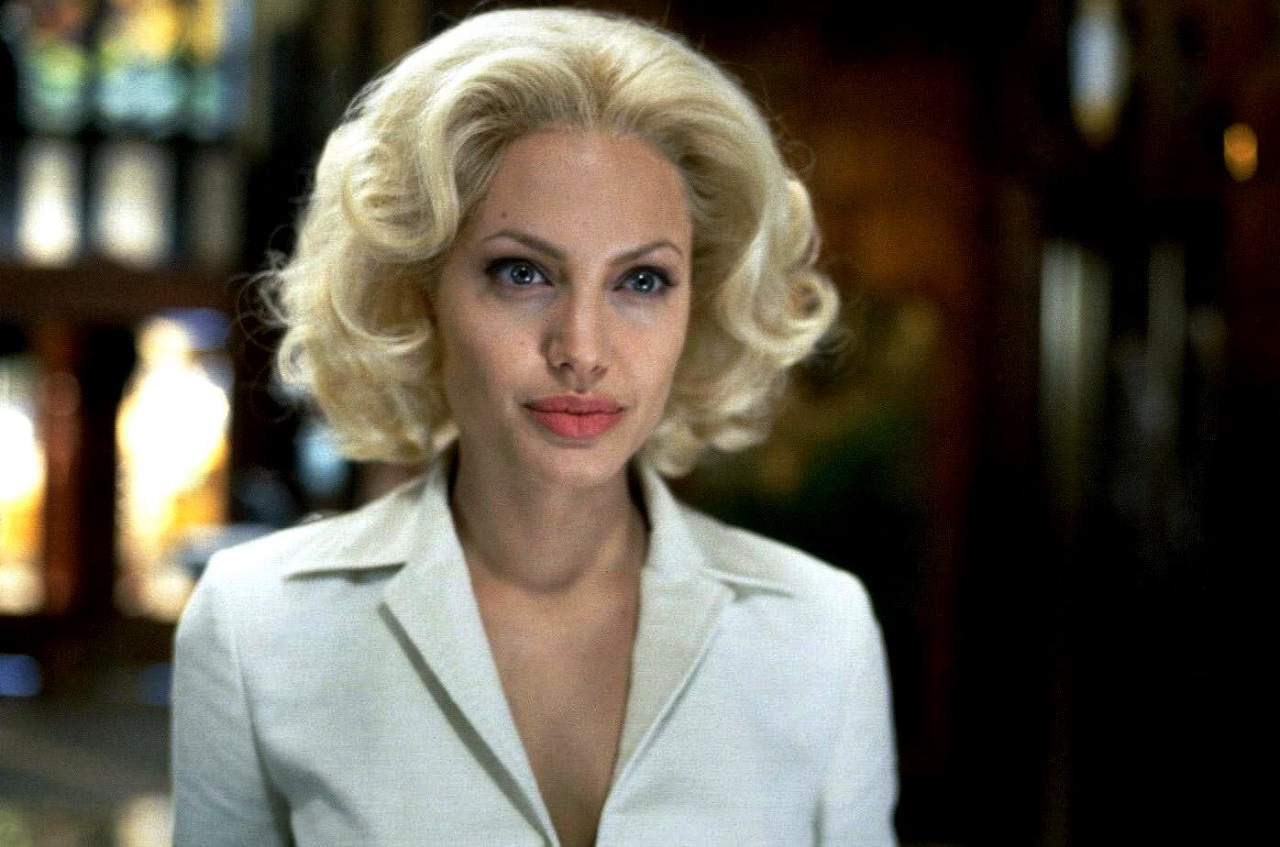 Angelina Jolie as tv newswoman Lanie Kerrigan in Life or Something Like It (2002)