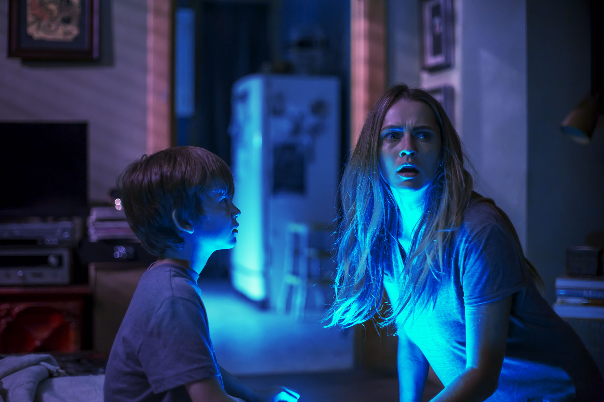 Gabriel Bateman and Teresa Palmer fear the dark in Lights Out (2016)