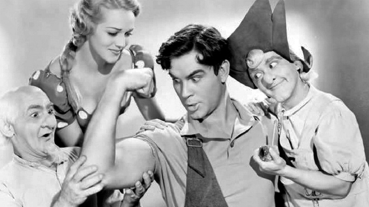 Li'l Abner (Granville Owen), Pappy Yokum (Johnnie Morris), Daisy Mae (Martha O’Driscoll) and Mammy Yokum (Mona Ray) in Li'l Abner (1940)