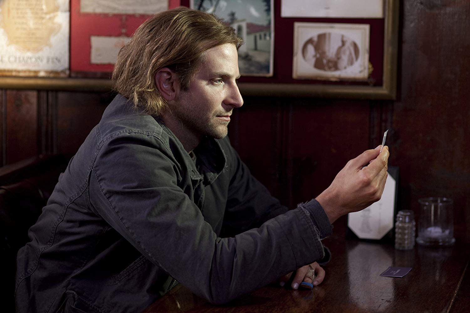 Bradley Cooper as the down-and-out loser contemplating the intelligence-expanding drug NZT-48 in Limitless (2011)