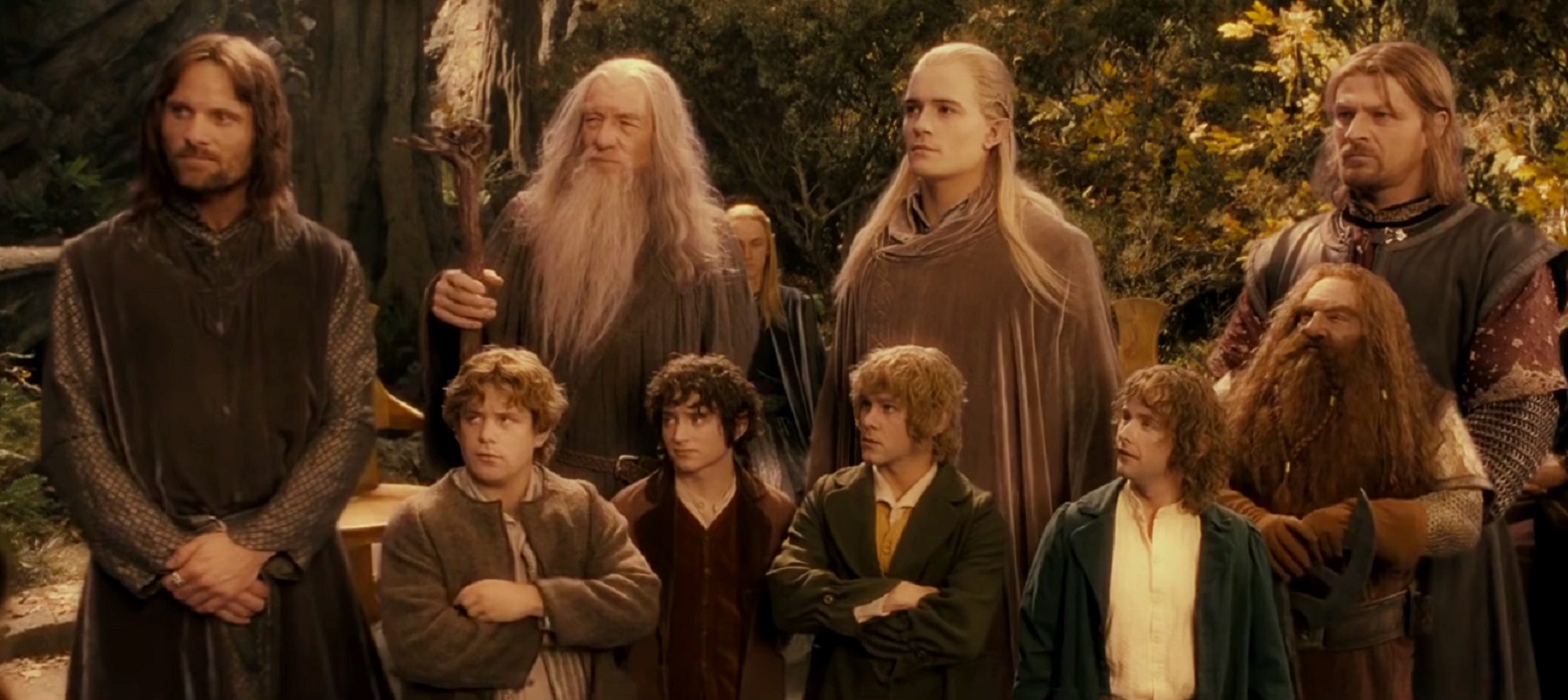 The Fellowship - Aragorn (Viggo Mortensen), Gandalf (Ian McKellen), Legolas (Orlando Bloom), Boromir (Sean Bean), Samwise Gamgee (Sean Astin), Frodo Baggins (Elijah Wood), Merry Brandybuck (Dominic Monaghan), Pippin Took (Billy Boyd) and Gimli (John Rhys-Davies) in The Lord of the Rings: The Fellowship of the Ring (2001)