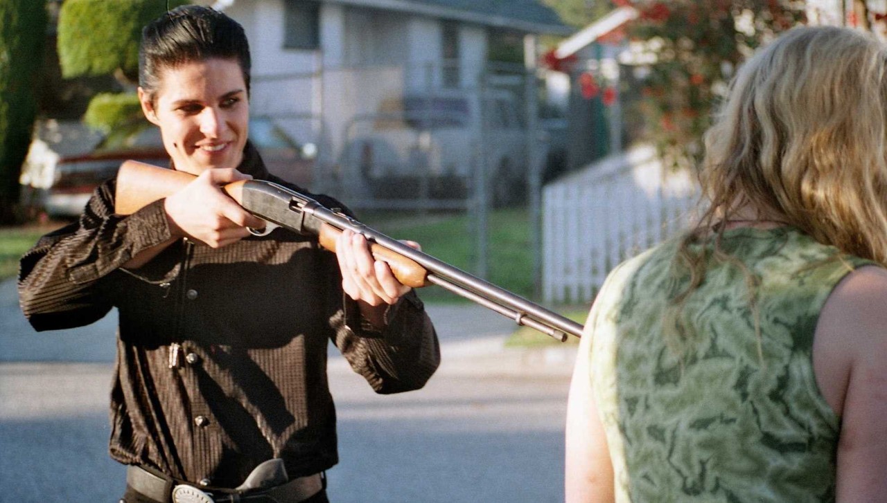 Marc Senter threatens Shay Astar with a gun in The Lost (2005)