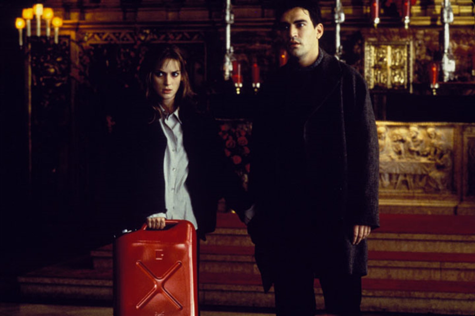 Winona Ryder and Ben Chaplin - facing the coming of the Anti-Christ in Lost Souls (2000)