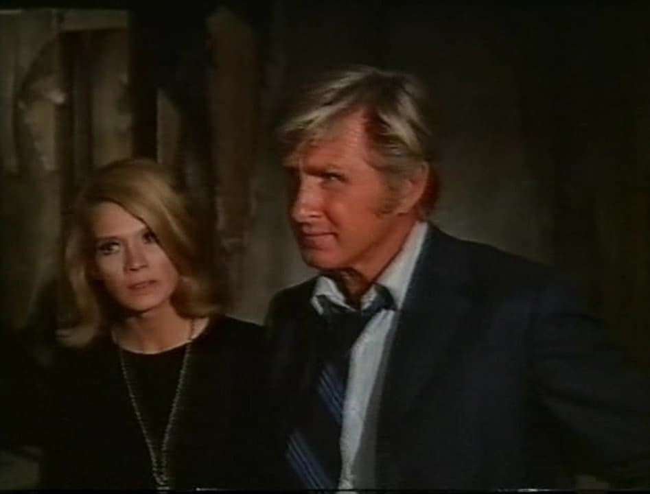 Angie Dickinson and mysterious alien visitor Lloyd Bridges in The Love War (1970)