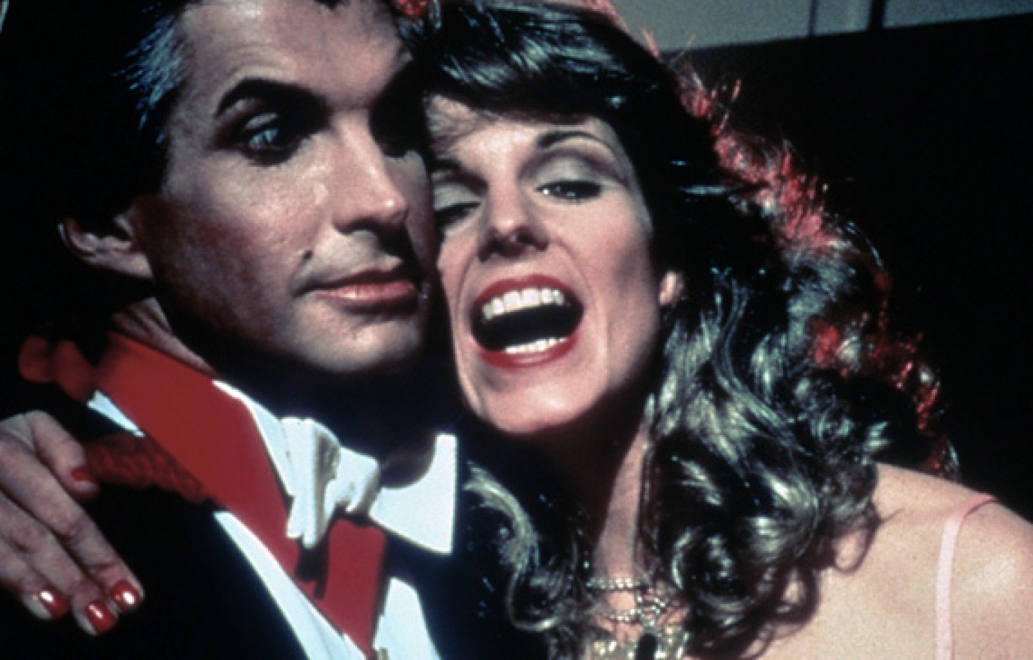 Count Dracula (George Hamilton) and his reincarnated lady love (Susan St James) in Love at First Bite (1979)