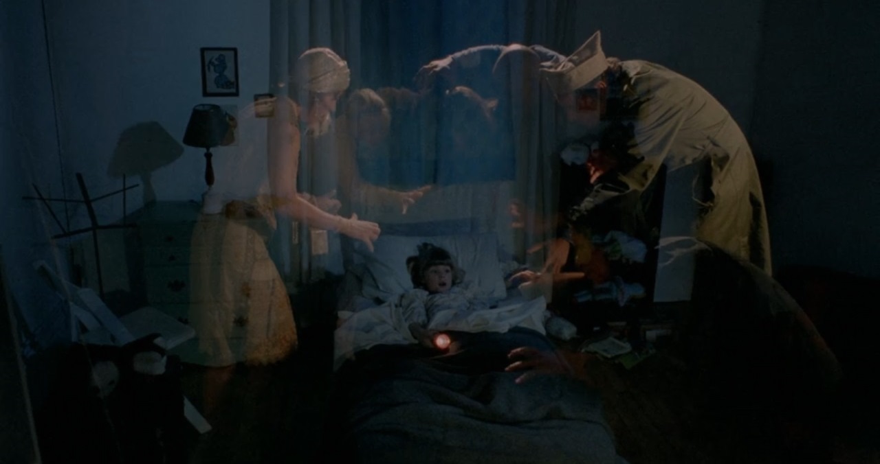 Young Cathy (Dana Nardell) surrounded by ghostly figures in Lurkers (1987)