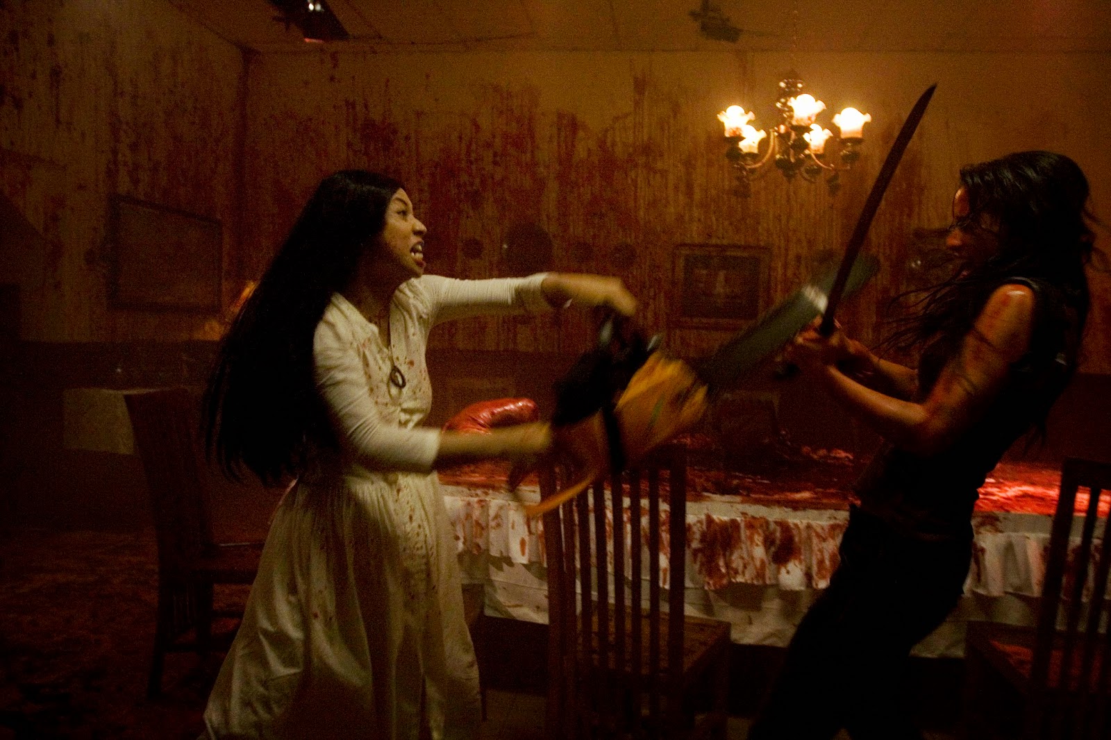 (l to r) Shareefa Daanish and Julie Estelle fight in the blood-drenched climax of Macabre (2009)