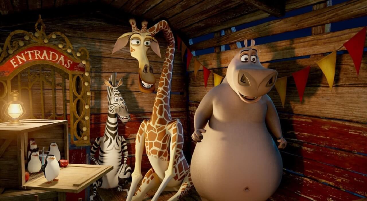 (l to r) The Penguins, Marty (voiced by Chris Rock), Melman (voiced by David Schwimmer) and Gloria (voiced by Jada Pinkett Smith) go to the circus in Madagascar 3: Europe's Most Wanted (2012)